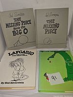 Four vintage Shel Silverstein books: The Missing Piece Meets the Big O, The Missing Piece, Lafcadio, The Lion Who Shot Back, and The Giving Tree displayed together.