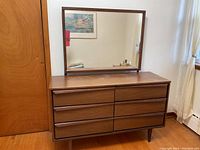 Full front view of dresser with attached mirror