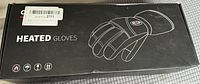 Closed retail box for heated gloves showing branding and image of gloves