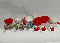 Photo of four vintage Pokemon toys from Burger King 1990 with their Pokeball cases