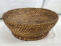 Full side view showing the shape, size, and weave of the basket.