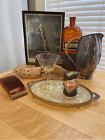 Overall lot display on wooden table showing all items grouped together