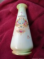 Full side view of Crown Devon vase showing tapered shape, floral decoration, and central medallion design.