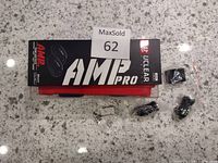 Top view of UCLEAR AMP Pro box and accessories on counter