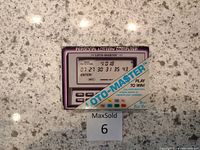 Photo of the original boxed product showing the front artwork and device image.