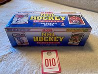 Photo of factory sealed box of 1990 Score NHL Hockey Premier Edition collector set showing box design and logos