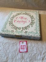 Outer cardboard box with holly border and 'Merry Christmas' text, Royal Doulton branding visible