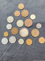 Top-down view of all coins arranged on fabric