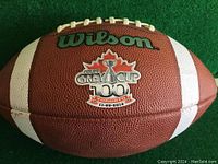 Front view of Wilson football showing the Grey Cup 100 logo with Toronto event date 11-25-2012