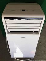 Front view of Comfee portable air conditioner unit showing air vent louvers and brand name.