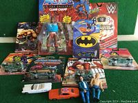 Photo of 6 items including Hot Wheels cars and action figures, some with packaging