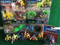 All mini figures shown together including 4 sets in packaging and 8 loose figures.