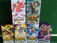 Front view of all six boxed Power Rangers figures showing box artwork