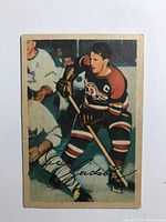 Front of the card showing Bill Gadsby in Chicago Blackhawks uniform with signature printed at bottom.