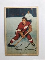 Front of 1953-54 Parkhurst hockey card featuring Tony Leswick in Detroit Red Wings uniform.