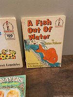 Front view of two children's books including 'A Fish Out Of Water' by Helen Palmer