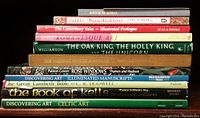 Stack of twelve books on Celtic and medieval topics, showing titles and spine details