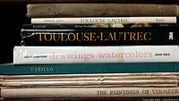 Photo showing stacked art books with titles including Toulouse-Lautrec, Rembrandt, Utrillo, and The Paintings of Vermeer.