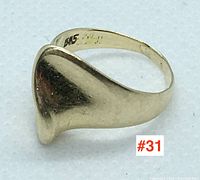 Side view showing smooth curved top and inner shank