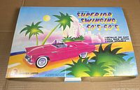 Packaging box showing 'Superior Swinging 50's-60's' die cast cars set with colorful illustration.