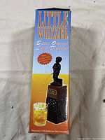Box with Little Whizzer branding and image of the liquor dispenser emitting liquid into a glass.