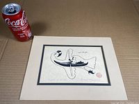 Print of 'Kayak in Bird' with Coke can for scale, showing complete artwork and matting.