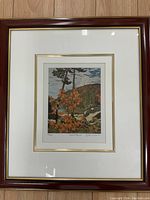 Framed limited edition print showing the full artwork with frame and matting.