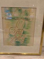 Framed artwork showing full front view of Adirondack chair scene