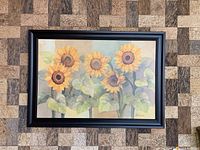 Front view of the framed sunflower painting showing the overall artwork and frame.
