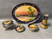 Full set arranged side-by-side showing all five pieces including tray, bud vase, hair receiver, ring holder, and jewelry dish.