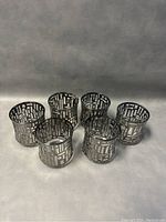 Group of six lowball glasses arranged in two rows