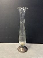 Front view of etched crystal bud vase with scalloped rim and weighted sterling silver base