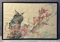 Framed Chinese watercolour painting showing the full artwork of birds perched on rock with blossoming branches and Chinese signature.