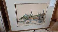 Full view of the framed print depicting Parliament Hill with trees and buildings.