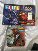 Boxed Star Wars The Game of Life A Jedi's Path board game showing front cover artwork with Jedi and Sith characters in space setting.
