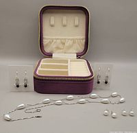 Overall lot with four pairs of earrings, necklace, and jewelry box
