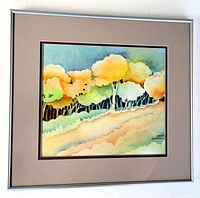 Frontal view of framed and matted watercolour painting with bright yellow, orange, green trees and landscape by Karen Campbell, signed lower right.