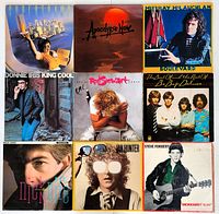 Front covers of 9 vinyl records arranged in a 3x3 grid showing album artwork and artist names.