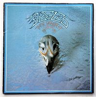 Front cover of The Eagles 'Their Greatest 1971 to 1975' album jacket with some creasing and wear visible.