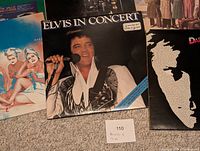 Close-up of Elvis In Concert double vinyl record with Elvis Presley on cover.