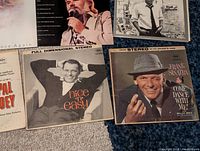 Photo showing various vinyl album covers including Frank Sinatra's Nice 'n' Easy and Come Dance With Me