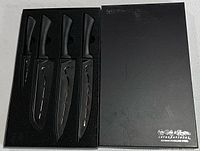 Top view of the closed black box with Hens & Rooster branding, displaying four knives inside foam inserts.