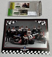 Two NASCAR tickets and a Goodwrench Service team photo with race car number 3, displayed on a white surface.