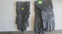 Two pairs of black leather motorcycle gloves, one pair with a Barbit logo and longer cuff, the other with an adjustable wrist strap.