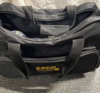 Black EPCO branded bowling ball bag, closed showing logo and handles.