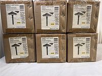 Six boxed stake lights stacked in two rows