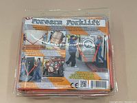 Back of packaged Forearm Forklift carrying straps with usage instructions and demonstration photos