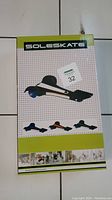 Photo of the Sole Skate product box showing the three-wheeled foot skate in black with size 32 label.
