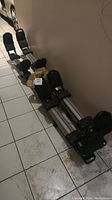 Pair of Thule roof rack crossbars with foot packs assembled on floor