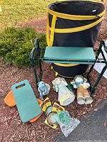 Full set of garden items including collapsible bin, bench, kneeling pads, garden figures, and garden wire ties.